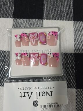 Pink Floral Press-On Nail Set by. Size Large. Short/Med. Length